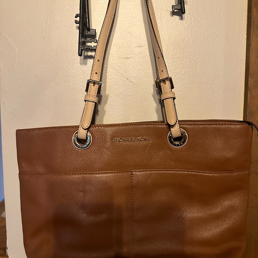 Michael Kors leather bag. Used once . Brown w/ cream straps .